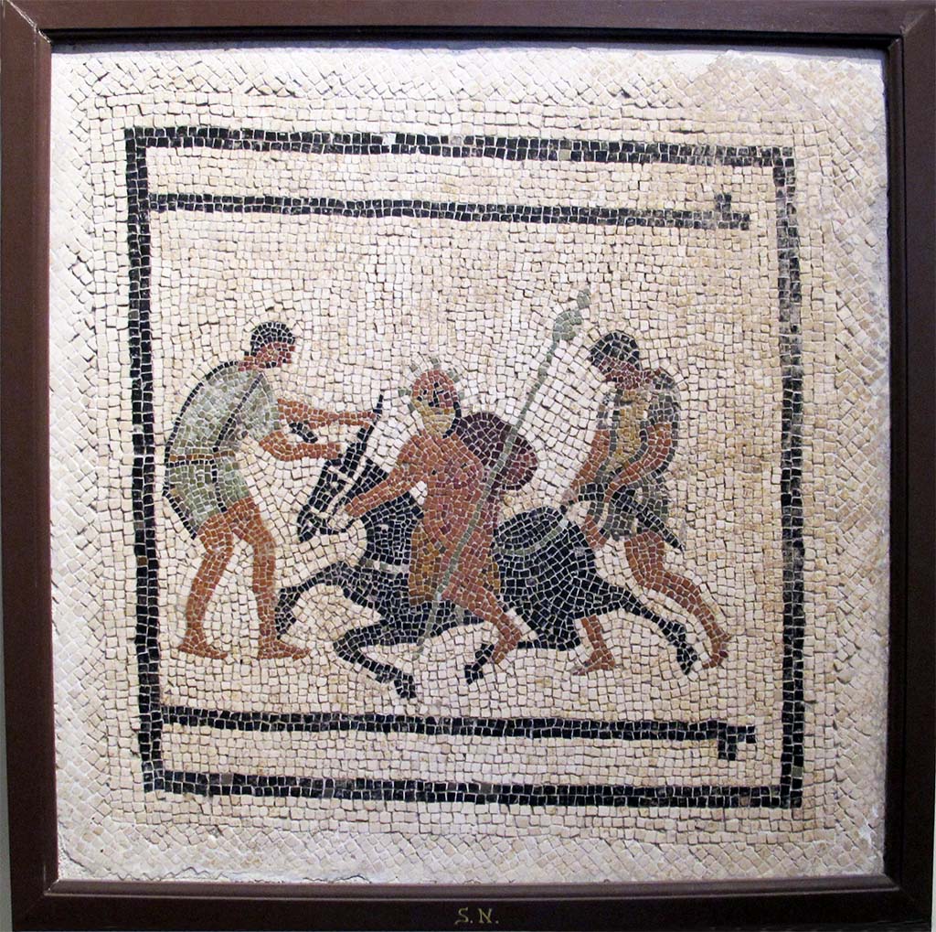 I.7.1 Pompeii. Mosaic from room in south-west corner of peristyle of a drunken Silenus on a donkey that is refusing to move.
He is being helped by two Satyrs. Now in Naples Archaeological Museum. Inventory number s.n.