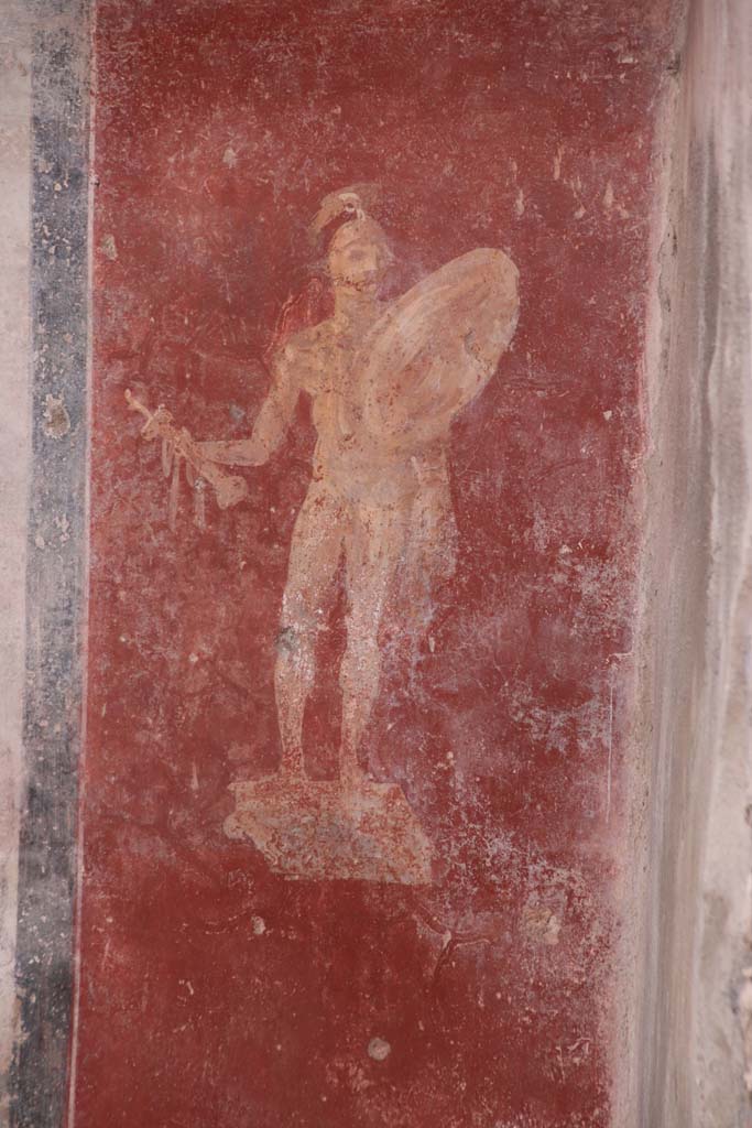 I.7.12 Pompeii. September 2021.
West end of south wall, detail of figure of a statue of a naked armed warrior.
Photo courtesy of Klaus Heese.