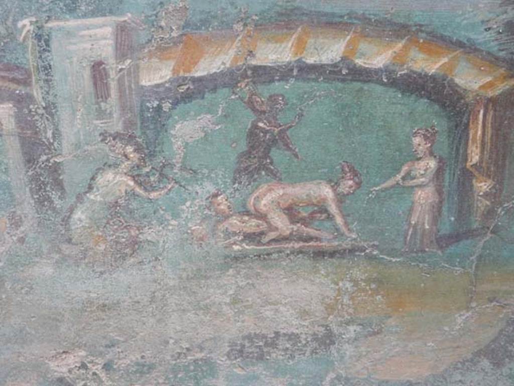 I.7.12 Pompeii. May 2017. Detail from painted panel on north end of west side of summer triclinium. Photo courtesy of Buzz Ferebee.