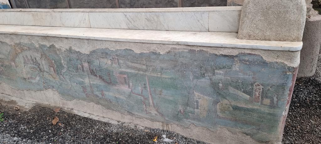 I.7.12 Pompeii. December 2023.
Painted panel on inside of west side of summer triclinium at north end. Photo courtesy of Miriam Colomer.