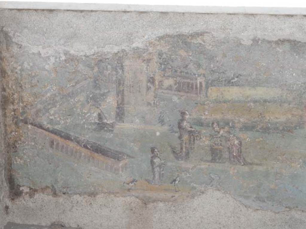 I.7.12 Pompeii. May 2017. Detail of painted panel on inside of west side of triclinium at south end. Photo courtesy of Buzz Ferebee.