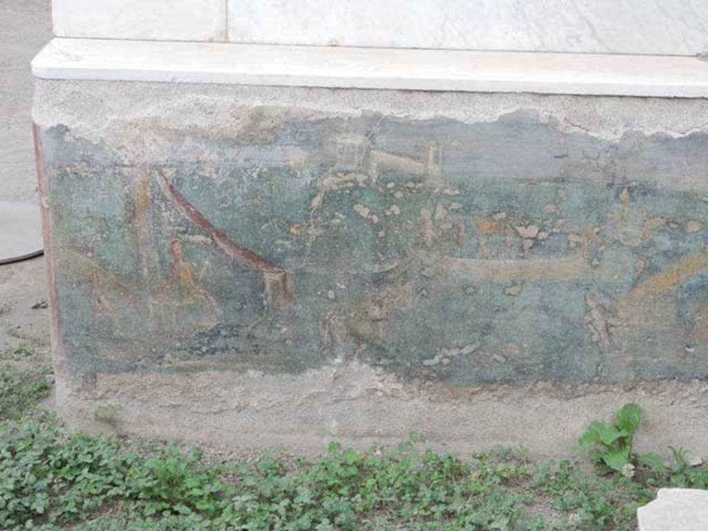 I.7.12 Pompeii. May 2017. Painted panel on inside of north end of east side of summer triclinium. Photo courtesy of Buzz Ferebee.