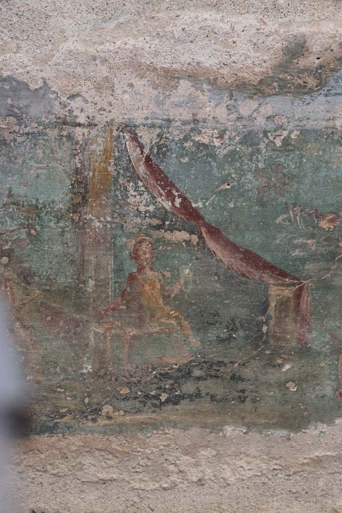 I.7.12 Pompeii. September 2021.
Detail from painted panel at north end of east side of summer triclinium. Photo courtesy of Klaus Heese.