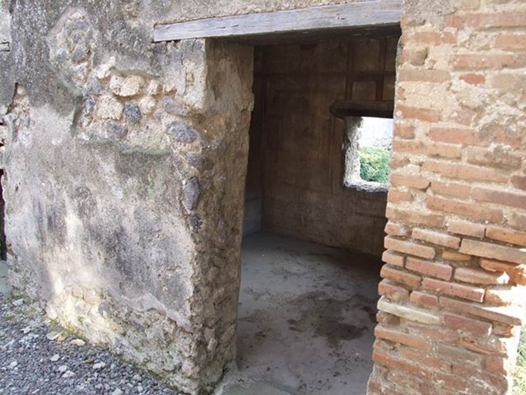I.7.12 Pompeii. December 2006. Looking south into doorway to cubiculum, on west side of kitchen.