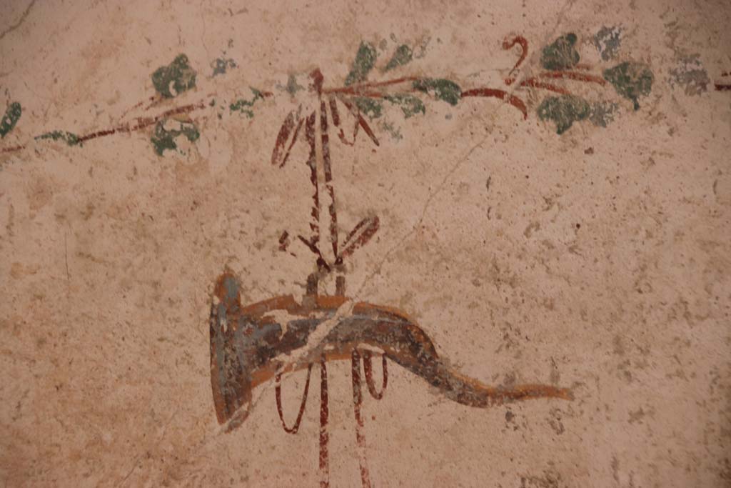 I.7.12 Pompeii. September 2021. Detail from upper east wall of cubiculum in south-east corner. Photo courtesy of Klaus Heese.