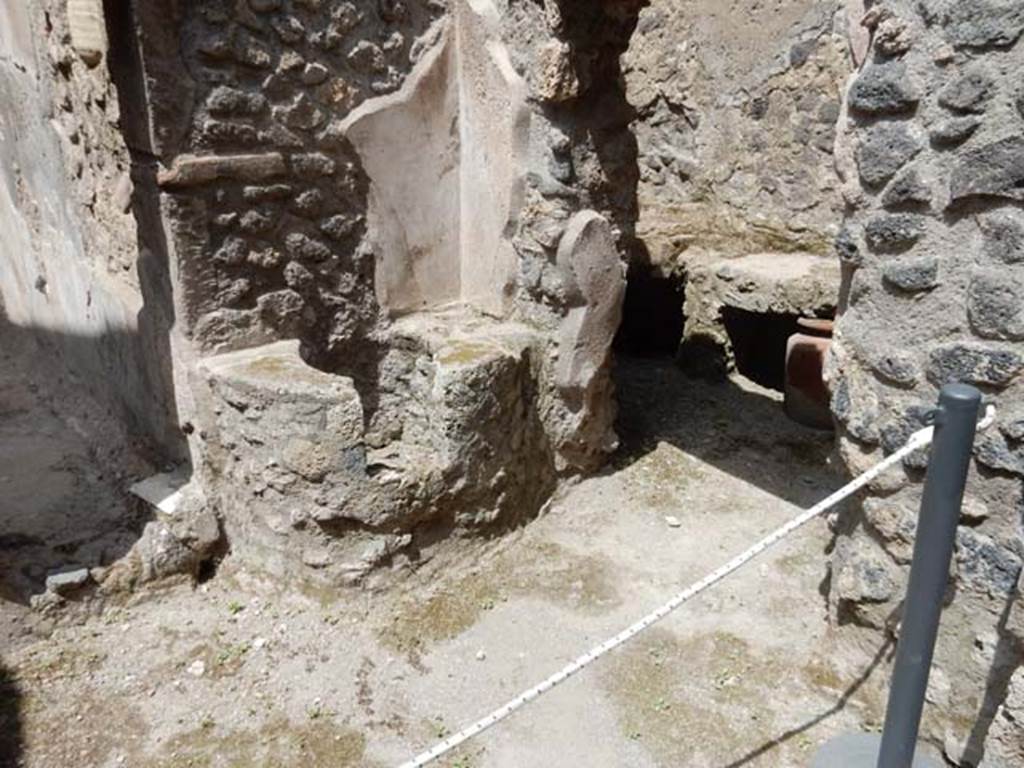 I.7.19 Pompeii. May 2017. Looking north-east in second small room on north side of corridor, with doorway to kitchen area, on right. Photo courtesy of Buzz Ferebee.