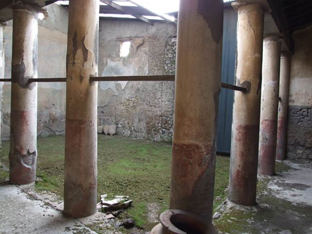 I.7.19 Pompeii. December 2006. Looking south-west across portico into garden.