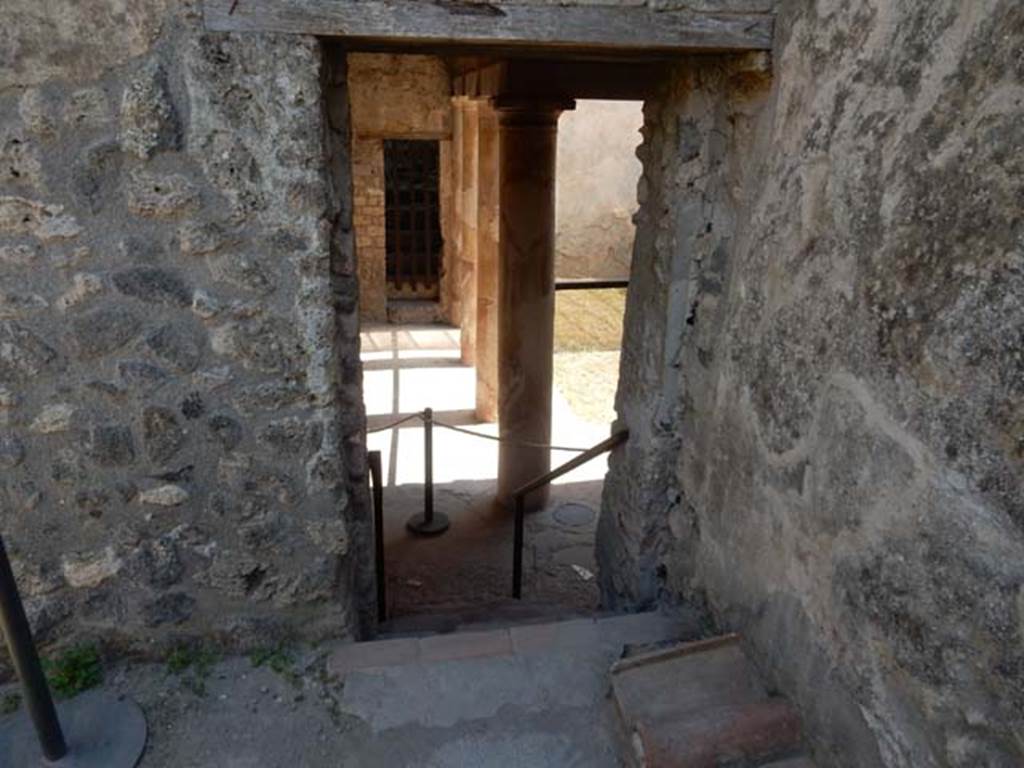 I.7.19 Pompeii. May 2017. Steps down to north portico from garden area of I.7.12.
Photo courtesy of Buzz Ferebee.