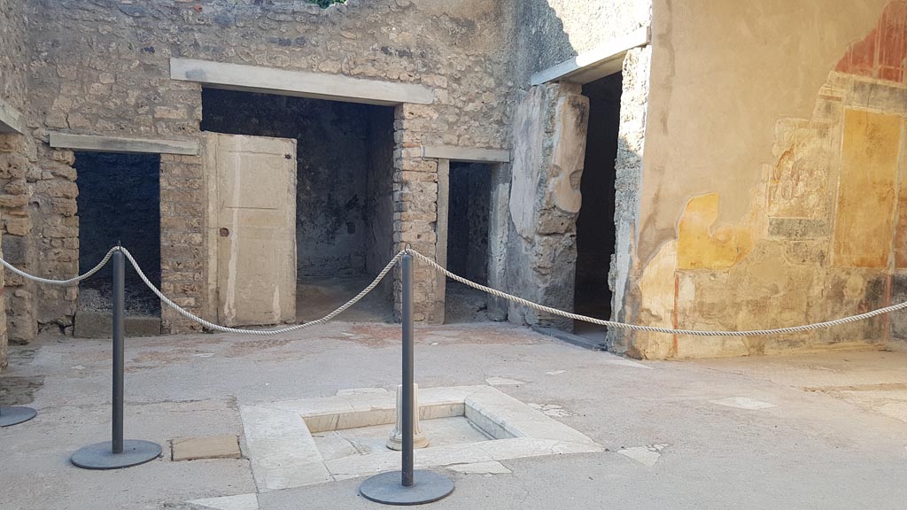 I.7.19 Pompeii. August 2023. Looking towards north side of atrium, and tablinum, on right. Photo courtesy of Maribel Velasco.