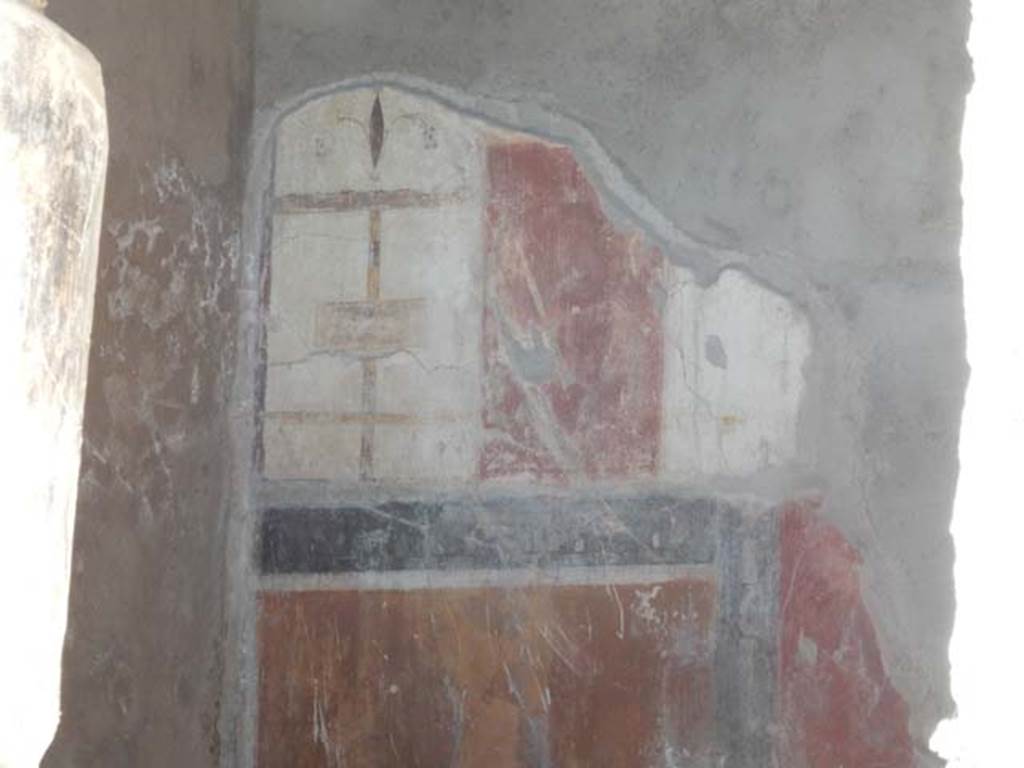I.7.19 Pompeii. May 2017. Detail from upper east wall of triclinium.
Photo courtesy of Buzz Ferebee.