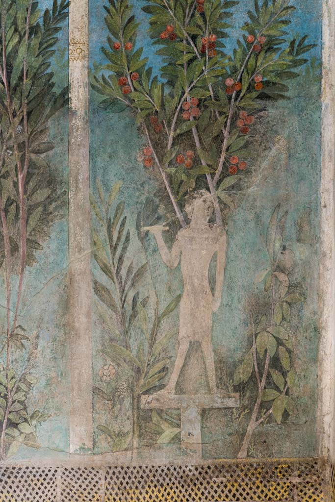 I.9.5 Pompeii. April 2022. Room 5, cubiculum. South end of east wall.
Detail of painting of Egyptian pharaonic statue and cherry tree.
Photo courtesy of Johannes Eber.