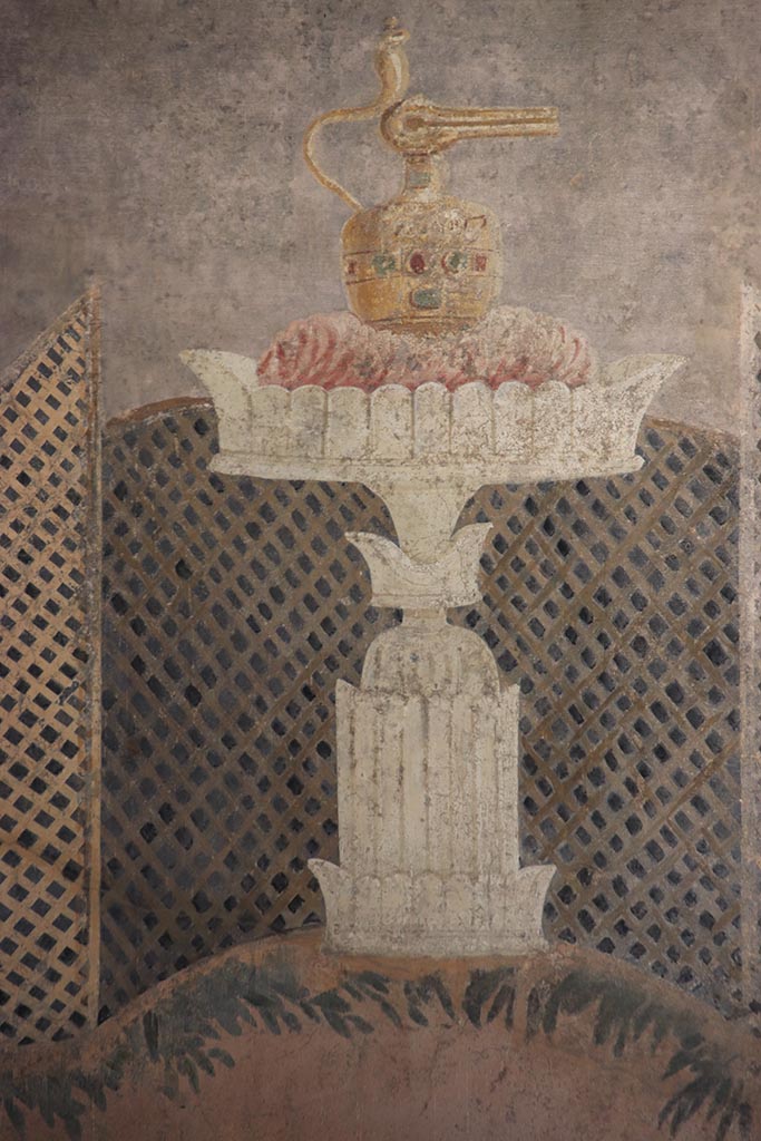 I.9.5 Pompeii. October 2024.
Room 11, looking towards centre of east wall with painted table with Isis jug or jar.
Photo courtesy of Klaus Heese