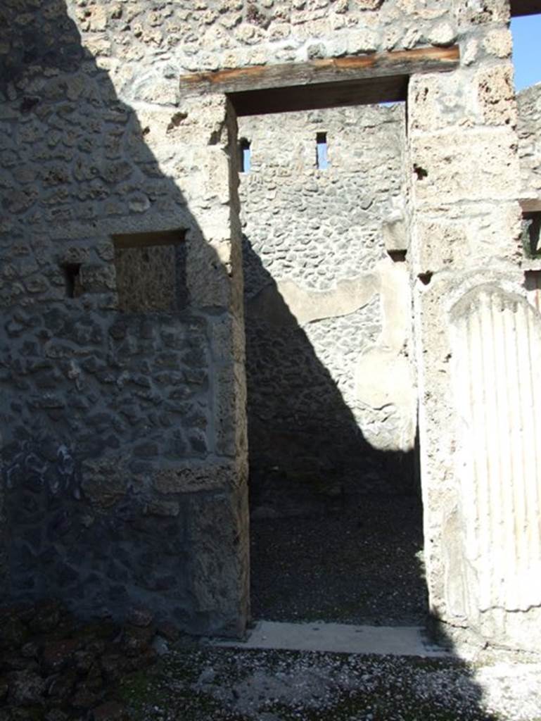 I.9.5 Pompeii. March 2009. Room 3. Atrium. Doorway to room 2 in north west corner.