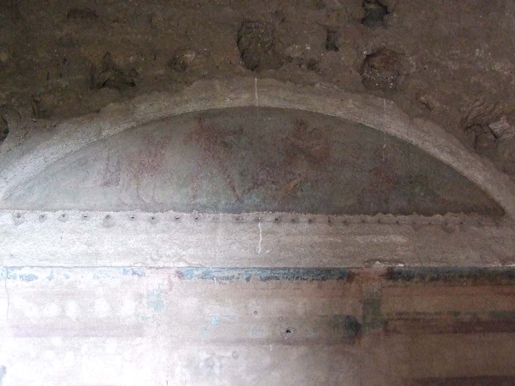 I.10.4 Pompeii. December 2006. Room 47, curved panel below ceiling with painting of Hercules, Deianira and Nessus.
See Bragantini, de Vos, Badoni, 1981. Pitture e Pavimenti di Pompei, Parte 1. Rome: ICCD. (p.130).