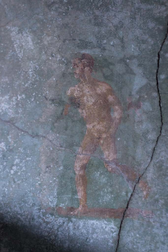 I.10.4 Pompeii. April 2022. Room 48, painting of athlete. Photo courtesy of Johannes Eber.