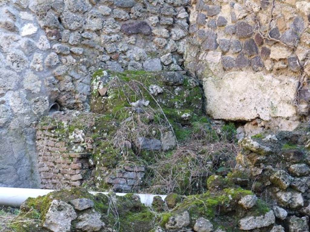 I.10.4 Pompeii. March 2009. South east corner at rear of Baths wall with remains of staircase.