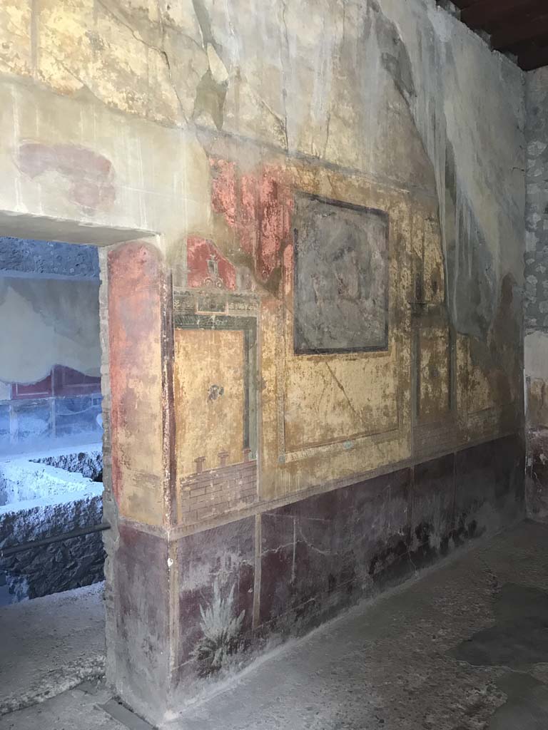 I.10.4 Pompeii. April 2019. Room 19, north wall with doorway to room 18.
Photo courtesy of Rick Bauer.