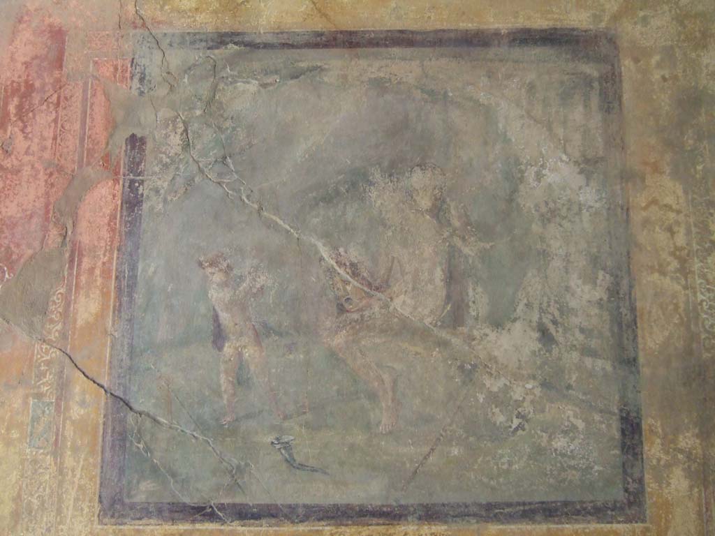 I.10.4 Pompeii. May 2006. Room 19, north wall. Wall painting of cherub scared by a tragic mask held by a nymph.
See Bragantini, de Vos, Badoni, 1981. Pitture e Pavimenti di Pompei, Parte 1. Rome: ICCD. (p. 126)