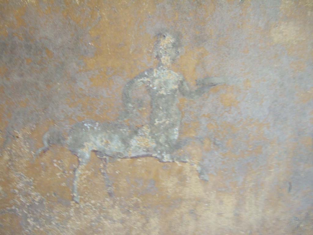 I.10.4 Pompeii. May 2006. Room 19, south wall. Painted centaur with patera.
See Bragantini, de Vos, Badoni, 1981. Pitture e Pavimenti di Pompei, Parte 1. Rome: ICCD. (p.127)