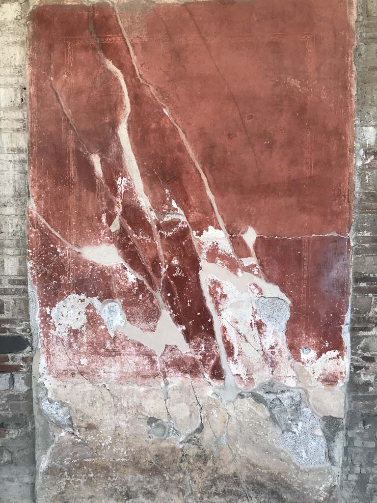 I.10.4 Pompeii. April 2019. East portico, panel between doorways to room 18 and corridor 16.
Photo courtesy of Rick Bauer.