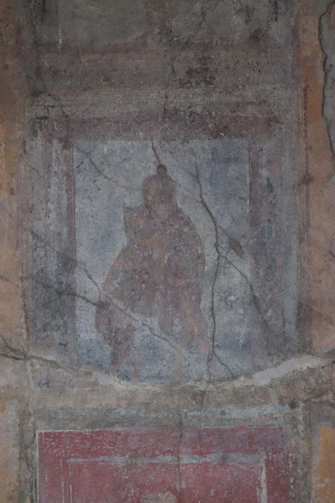I.10.4 Pompeii. September 2021.
Room 18, detail of painted panel of Satyr and Silenus from centre of east wall. Photo courtesy of Klaus Heese.