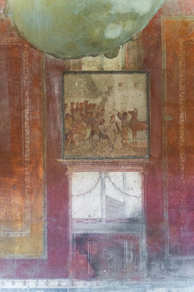 I.10.4 Pompeii. April 2022.
Room 4, central panel on east wall with painting of Cassandra and the wooden Trojan horse.
Photo courtesy of Johannes Eber.
