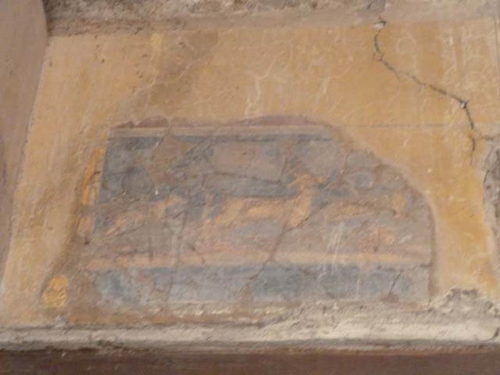 I.10.4 Pompeii. September 2015. Atrium, on the south wall above doorway to corridor 9. Painting of a dog chasing a deer.