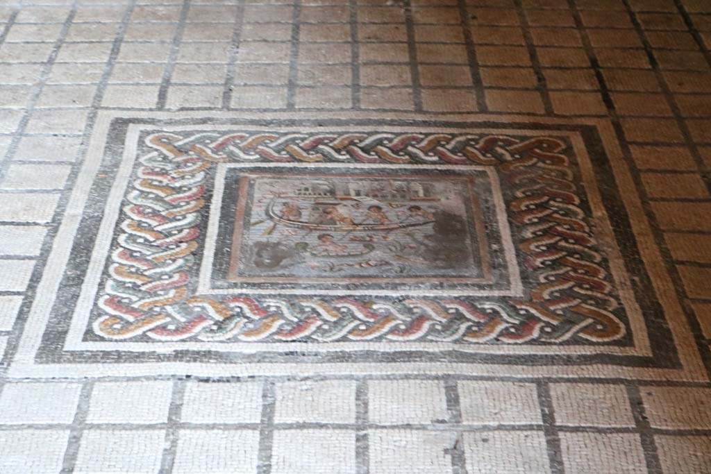 I.10.4 Pompeii. December 2018.
Room 11, mosaic of pygmies in Nile scene in centre of mosaic floor. Photo courtesy of Aude Durand.