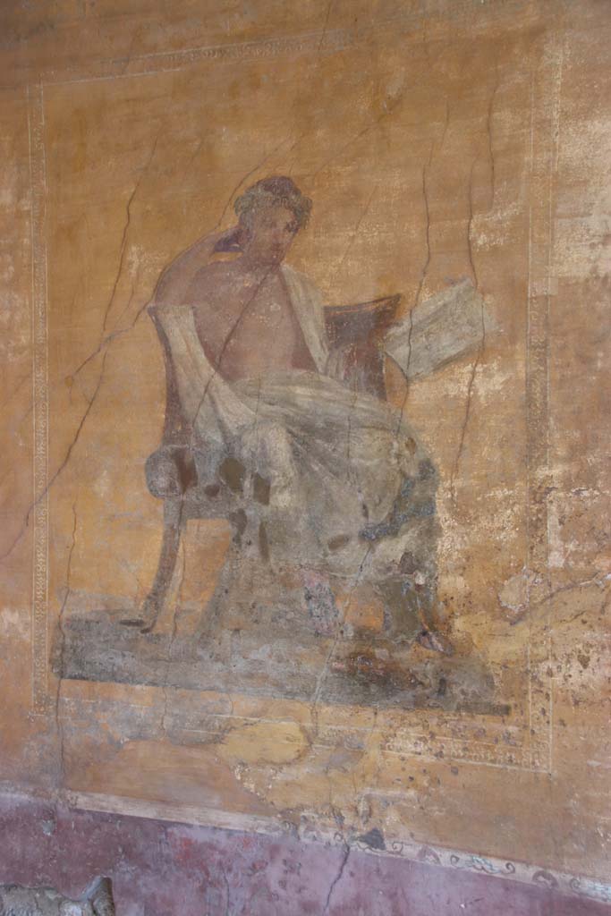 I.10.4 Pompeii. September 2021.
Alcove 23, west wall with wall painting of poet. Photo courtesy of Klaus Heese.