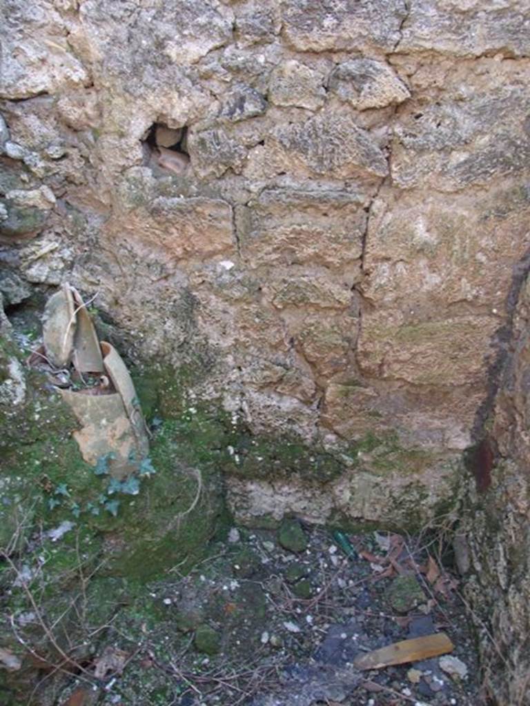 I.10.8 Pompeii. March 2009. Room 7, latrine at south end.