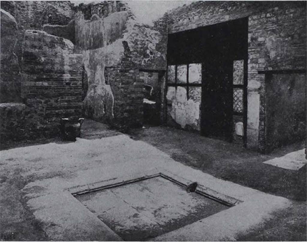 I.10.8 Pompeii. Looking towards south-east corner of atrium, and doorway to room 8, tablinum.
According to NdS, this room was not the tablinum but was a day-bedroom (cubicolo diurno). The room obtained by a screen of opus craticium with wood and masonry was an almost square day-room, in which found on the rustic floor in the ash was an imprint of the shape of a low and wide bed with wooden frame.
Il vano ricavato da un tramezzo ad opus craticium ad ossatura di legno e di fabbrica era un cubicolo diurno quasi quadrato; nel quale sul rustico pavimento a piano di fabbrica era rimasta conservata nella cenere l’impronta di un basso e largo letto a telaio di legno.
See Notizie degli Scavi, 1934, p. 312-3, fig. 25.