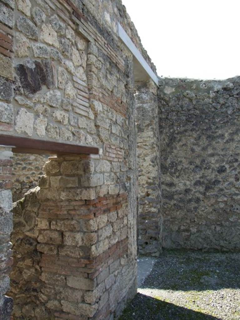 I.10.8 Pompeii. March 2009. Doorway to corridor 7 to rear, and room 8 on west side of atrium.
