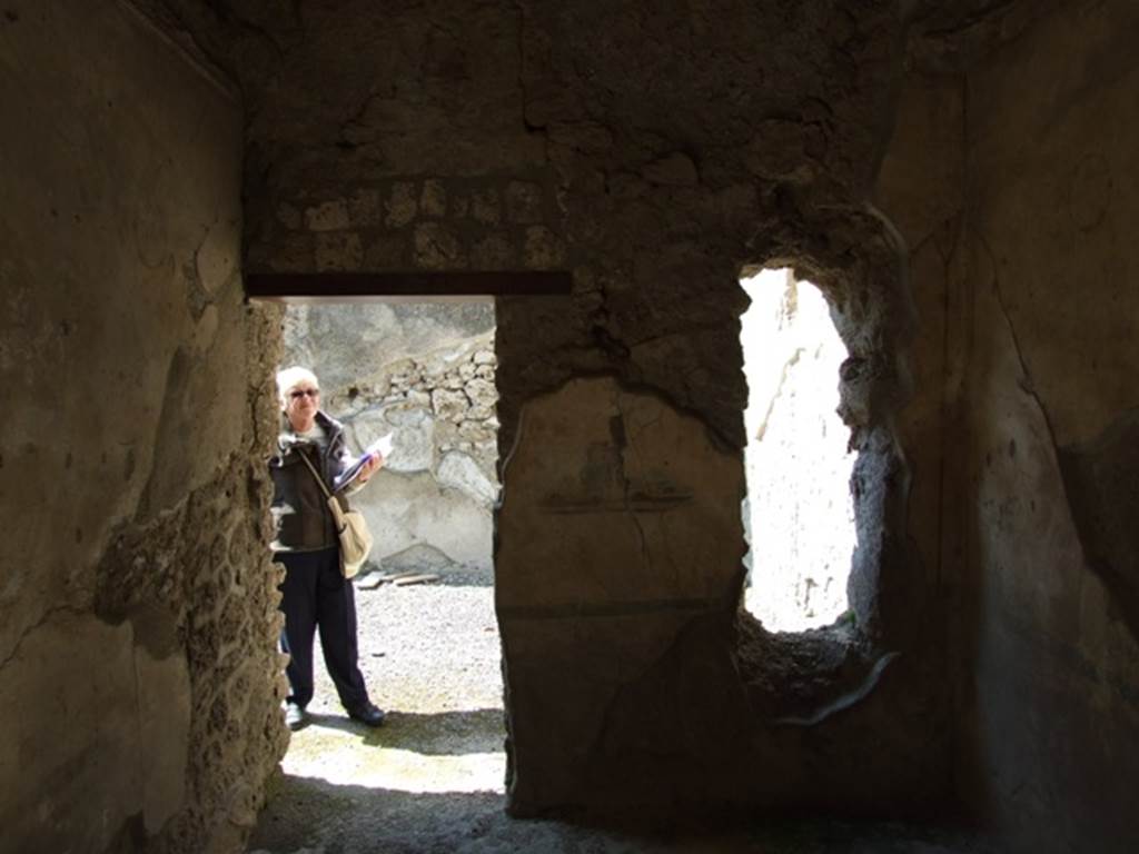 I.10.8 Pompeii. March 2009. Room 3, west wall with doorway from cubiculum into oecus/exedra.