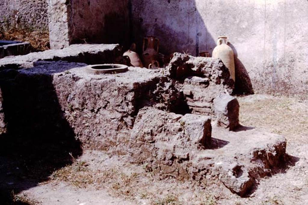 I.11.11 Pompeii. 1964. Looking south-west across counter in bar-room. Photo by Stanley A. Jashemski.
Source: The Wilhelmina and Stanley A. Jashemski archive in the University of Maryland Library, Special Collections (See collection page) and made available under the Creative Commons Attribution-Non Commercial License v.4. See Licence and use details.
J64f1797
