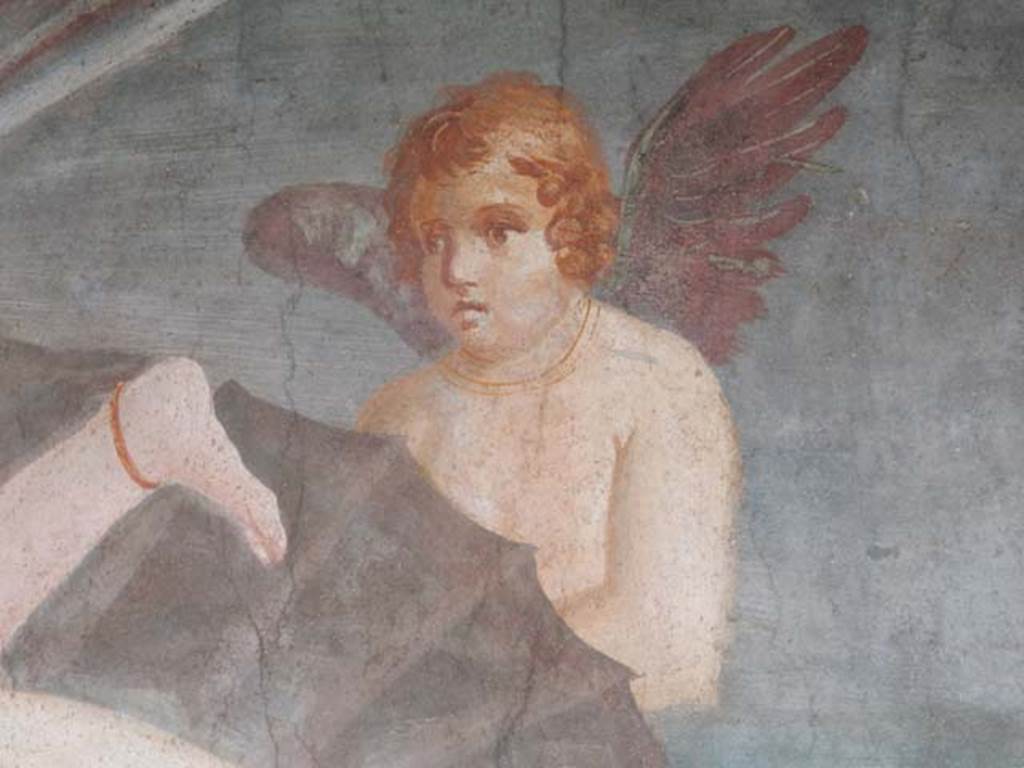 II.3.3 Pompeii. May 2016. Room 11, detail of cupid/amorino supporting the shell of Venus/Aphrodite.
Photo courtesy of Buzz Ferebee.