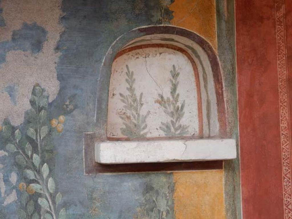 II.3.3 Pompeii. May 2016. Room 11, west panel on south wall of peristyle. Niche. Photo courtesy of Buzz Ferebee.