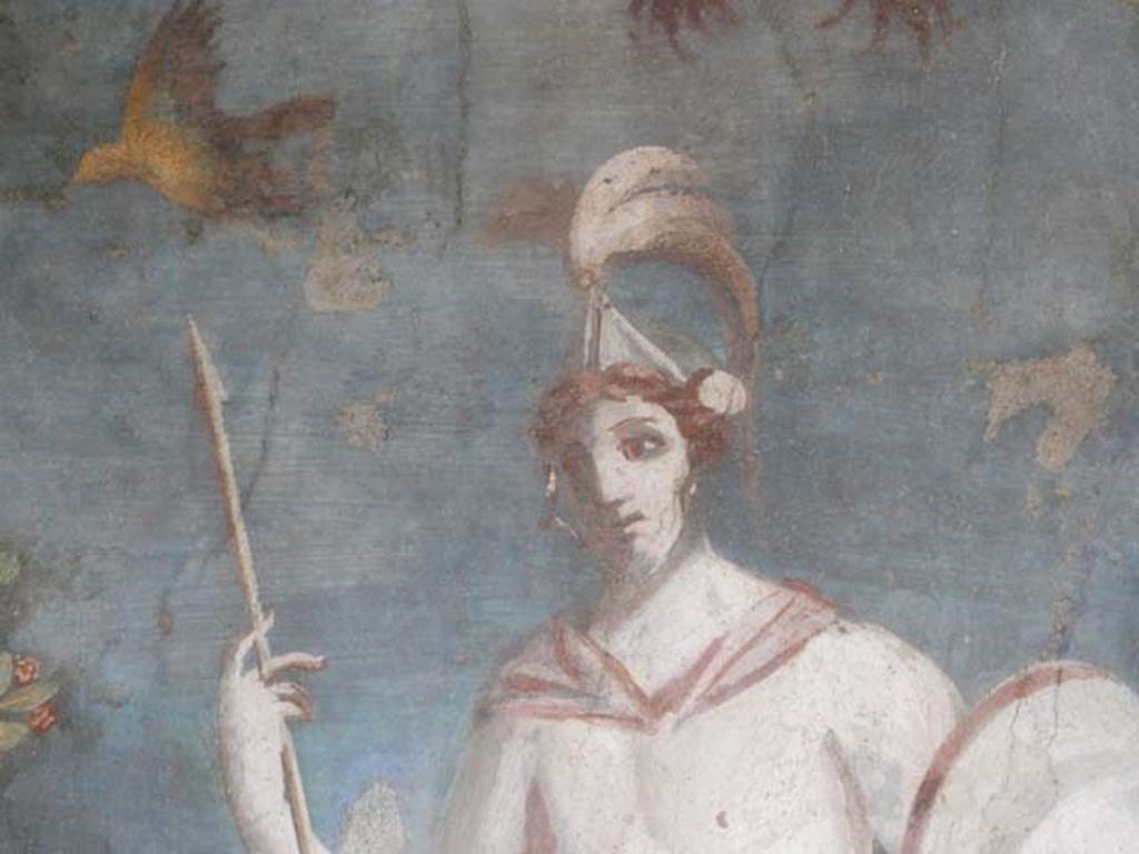 II.3.3 Pompeii. May 2016. Room 11, east panel on south wall of peristyle. Detail of upper part of statue of naked Ares / Mars with a lance and shield. Photo courtesy of Buzz Ferebee.