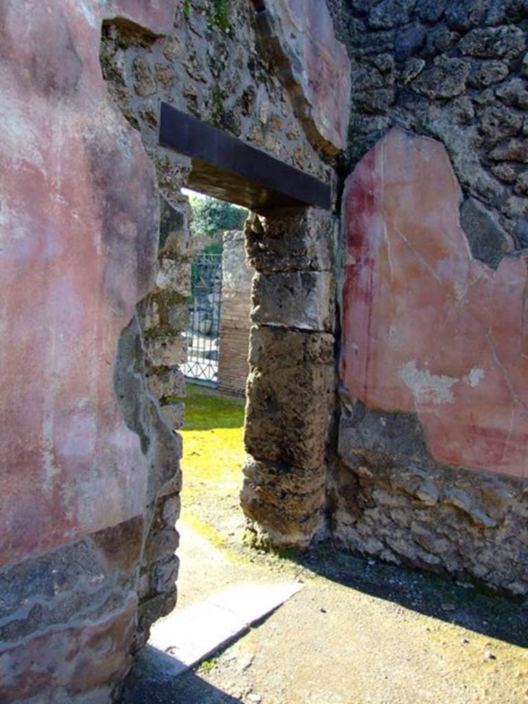 II.3.3 Pompeii. March 2009. Doorway to II.3.1 and II.3.2 from north-west corner of room 2, the atrium.