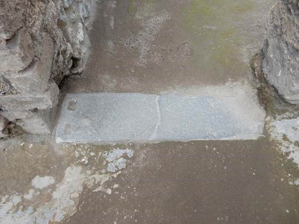 II.3.3 Pompeii. May 2016. Doorway threshold to room leading to II.3.1and II.3.2.
Photo courtesy of Buzz Ferebee.