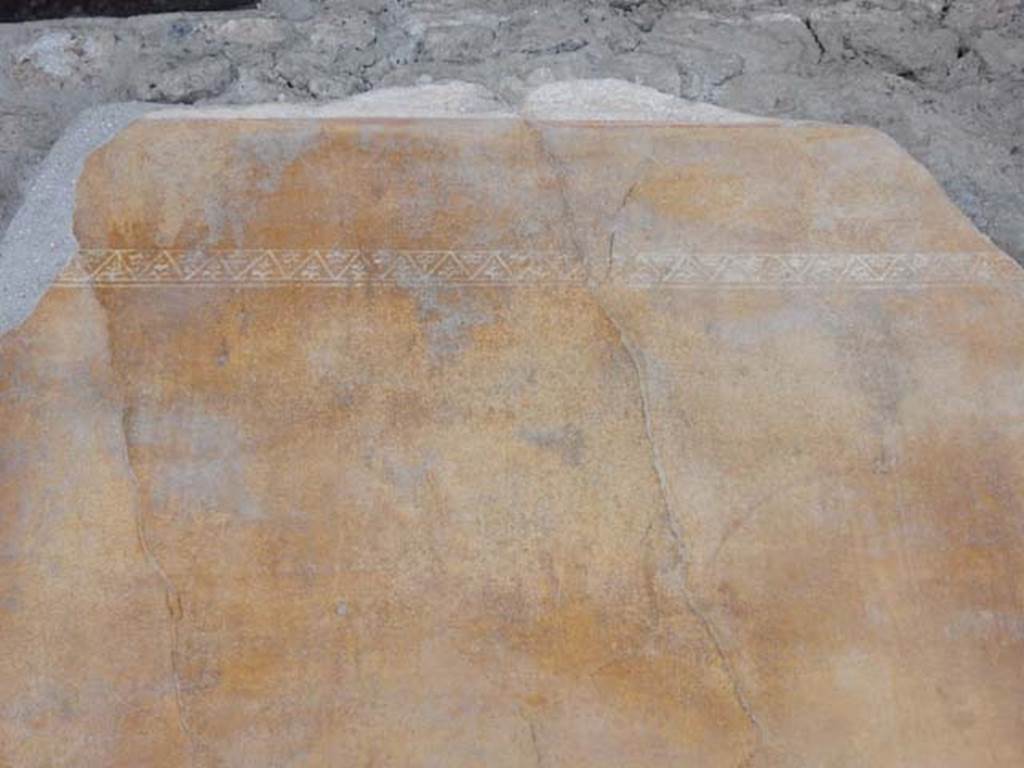 II.3.3 Pompeii. May 2016. Detail of painted east wall in north-east corner of room 11. Photo courtesy of Buzz Ferebee.