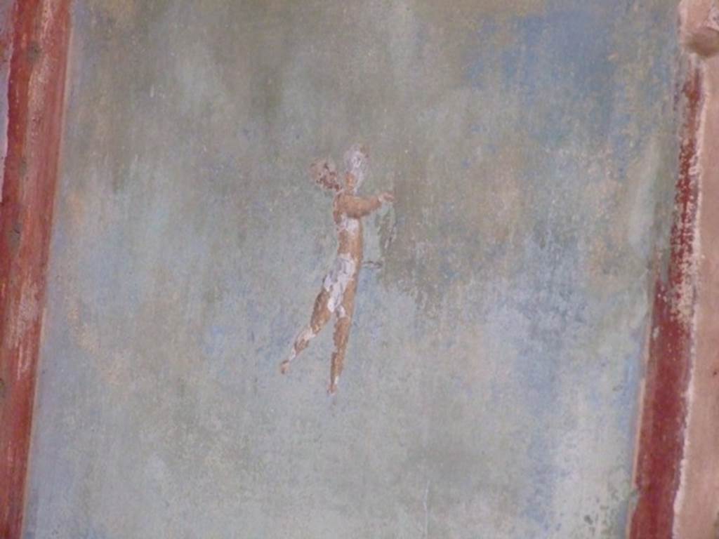 II.3.3 Pompeii. March 2009. Room 10, West wall. Painting of flying cherub.