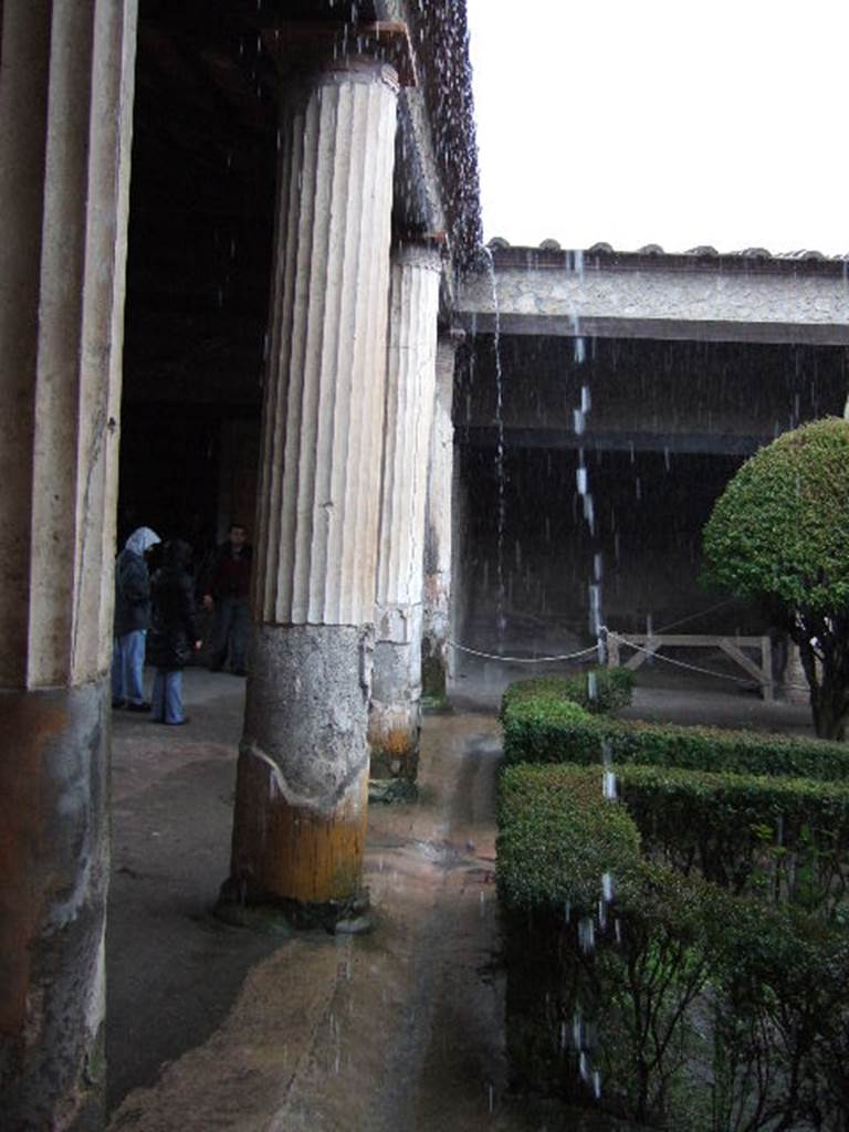 II.3.3 Pompeii. December 2005. Room 11, north portico, looking east.
Rainwater gutter in use