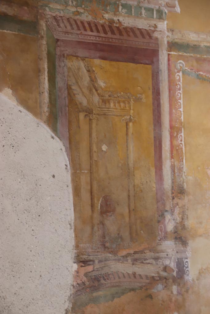 II.3.3 Pompeii. May 2024.
Room 12, south wall, detail of painted panel on east side of central painting. Photo courtesy of Klaus Heese.