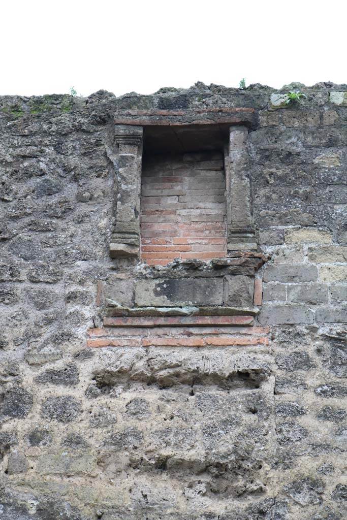 II.4.6 Pompeii. December 2018. 
Niche/recess on upper front façade on left of entrance doorway. Photo courtesy of Aude Durand.


