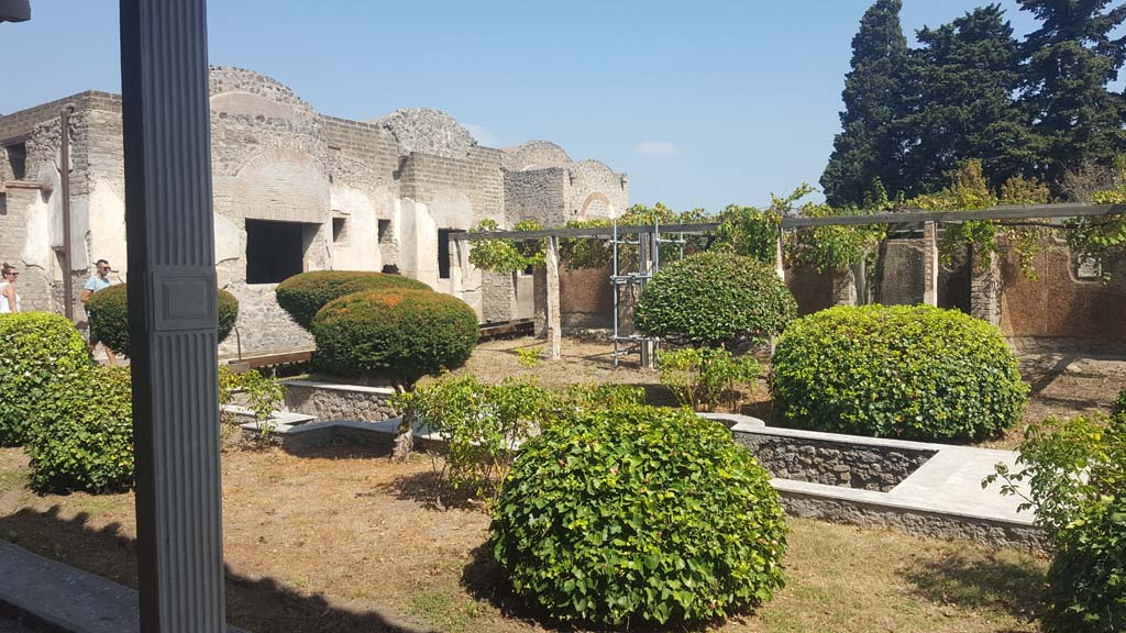 II.4.6 Pompeii. September 2019. Looking north-east across garden area towards south side of baths’ building.
Photo courtesy of Klaus Heese.