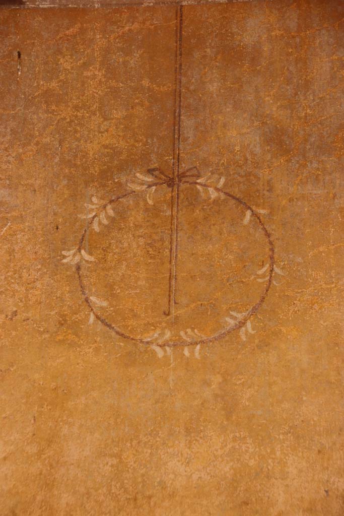 II.4.6 Pompeii. September 2019. Detail of painted decoration on west wall of portico.
Photo courtesy of Klaus Heese.