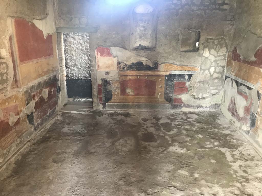 II.4.6 Pompeii. April 2019. Looking towards west wall of room on north side of summer triclinium.
Photo courtesy of Rick Bauer.
