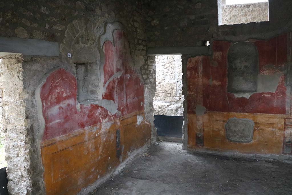 II.4.6 Pompeii. December 2018.
Looking towards south wall, and doorway to rear corridor in south-west corner, in room at south end of west portico.
Photo courtesy of Aude Durand.