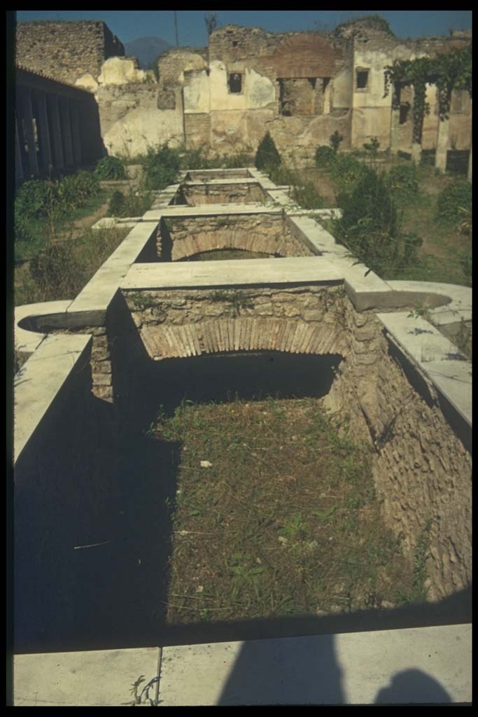 II.4.6 Pompeii. Euripus, or water feature, looking north.
Photographed 1970-79 by Günther Einhorn, picture courtesy of his son Ralf Einhorn.