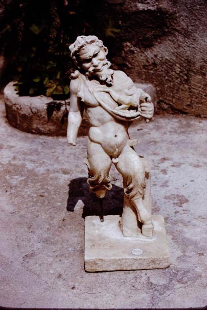 II.4.6 Pompeii, 1972. Statuette of marble satyr found at the north end of the pool.
Photo by Stanley A. Jashemski.
Source: The Wilhelmina and Stanley A. Jashemski archive in the University of Maryland Library, Special Collections (See collection page) and made available under the Creative Commons Attribution-Non Commercial License v.4. See Licence and use details.
J72f0310